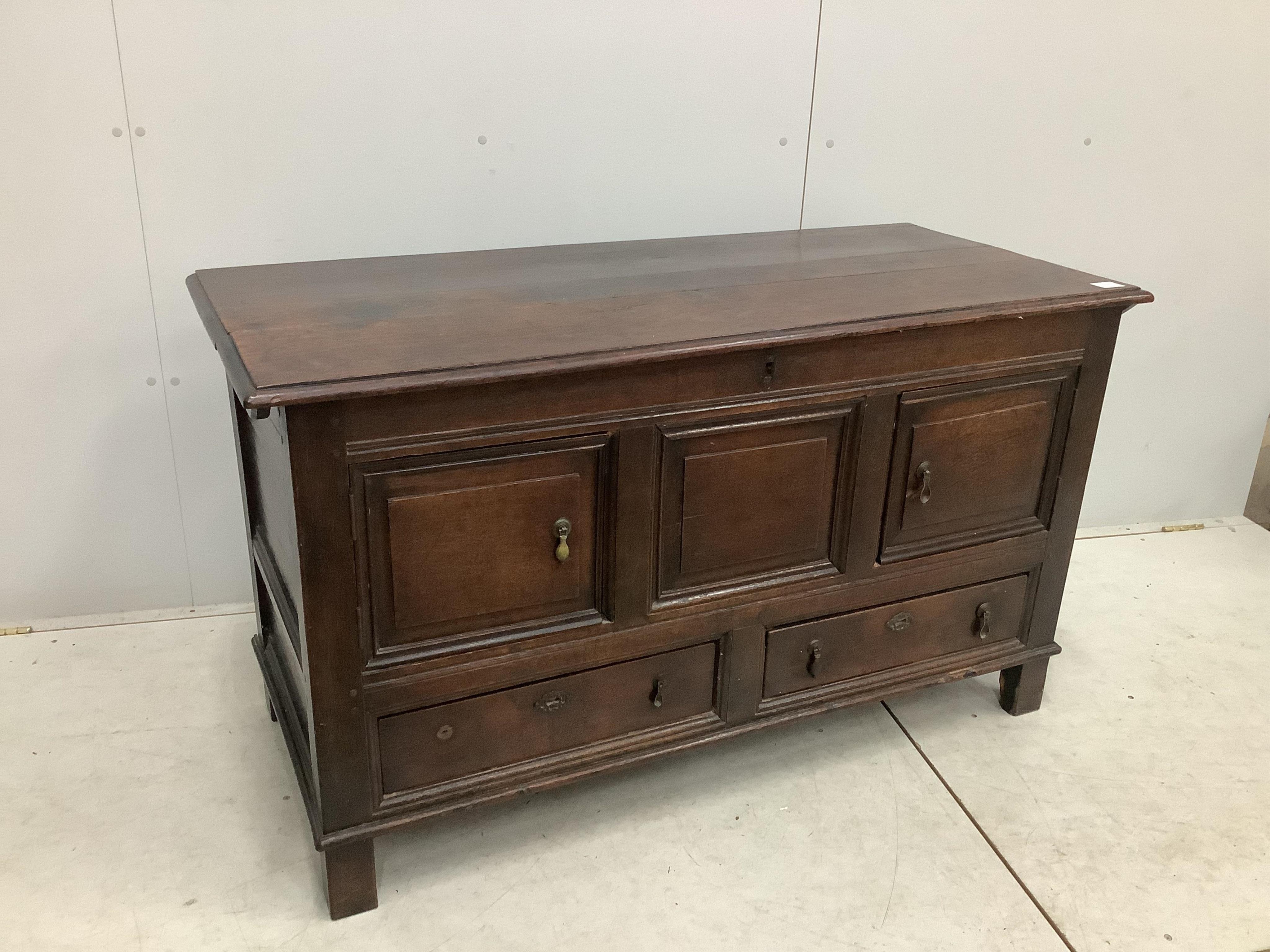 An 18th century oak mule chest, adapted, width 132cm, depth 56cm, height 77cm. Condition - fair